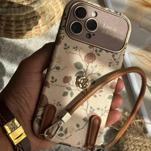 قاب موبایل ( آیفون ) گل رز فلورا قهوه ای + بندست چرمی