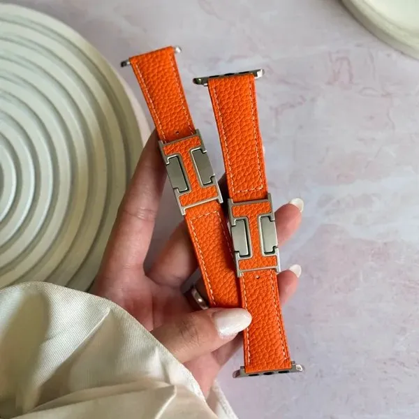بند اپل واچ چرمی هرمس نارنجی با قفل طرح هرمس (کدw5075)