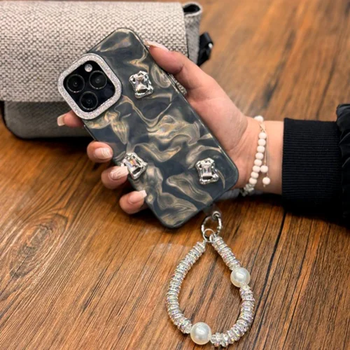 قاب موج دار سنگی همراه با اویز مرواریدی